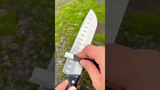 Reshaping a Large Cleaver Blade Using a Hand File on a Wooden Workbench for Precision