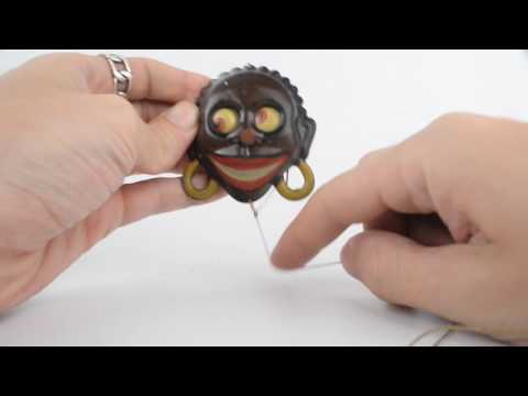 Antique Early 20th Century Black Americana Googly Eye Tin Toy Pin