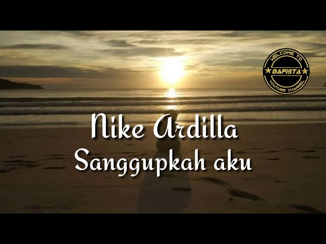 Nike Ardilla - Sanggupkah aku ( Lirik ) | Lagu sedih class=