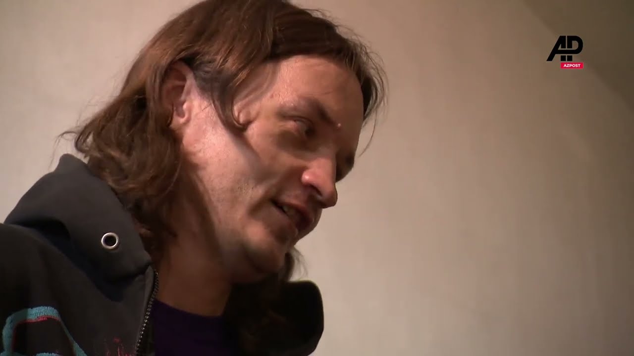 Belarusian activists recreate KGB prison treatment to highlight rights situation in country