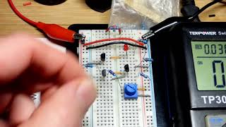 NPN BJT Switch Controlled By 2 Transistor Schmitt Trigger Circuit