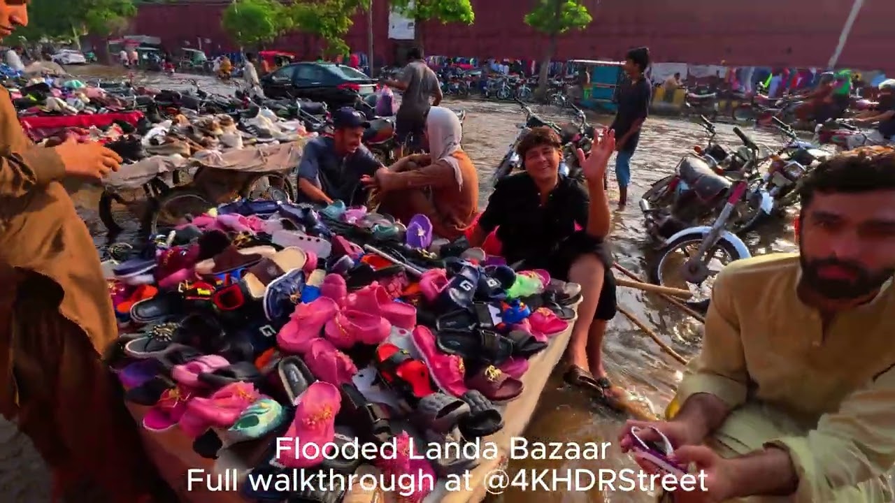 Chaos & Resilience: Navigating Flooded Streets of Landa Bazaar, Lahore