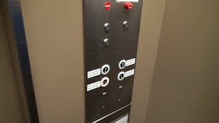 Old Haughton Traction Elevator with Serge Buttons