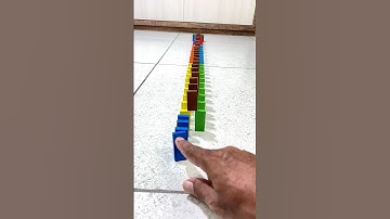 Dominos Falling Nicely #reverse #shorts #satisfying #entertaining #fun #beads #short #asmr #funny