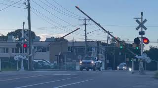 LIRR Trains Passing by Mastic at the Railroad Crossing
