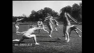 1930 MONTAGE Women performing gymnastics swinging ball exercises, May 17, 1930
