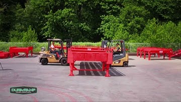 Using Two Standard Warehouse Forklifts to Off-Load a Portable Loading Ramp