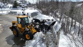 Moving snow with wheel loader