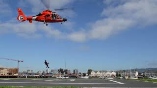 K-9 team training with a eurocopter hh-65 dolphin at alameda island