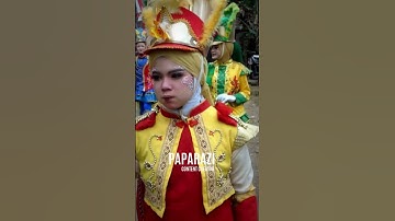 the beautiful little sister of the drum band majorette