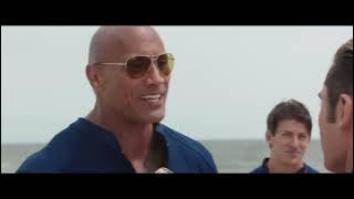 Zachary Vazquez in “Baywatch” Doughnut Scene. Zac Efron / Dwayne Johnson