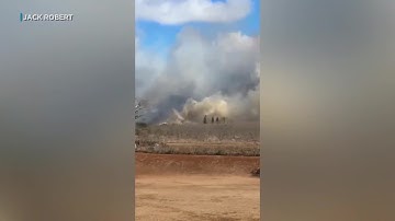 Evacuations lifted on Maui as crews battle 300-acre brush fire