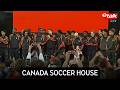 Team Canada celebrates at the ‘Canada Soccer House Toronto’ pep rally