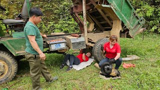 Mechanic girl repairs and realigns car bridges