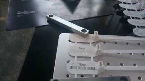 Plastic seals with barcode UV laser marking machine