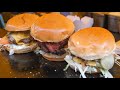 Big Burgers and Hot Dogs Slowly Cooking. London Street Food