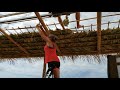 Building traditional mexican palm roof in offgrid desert eco ranch. Timelapse