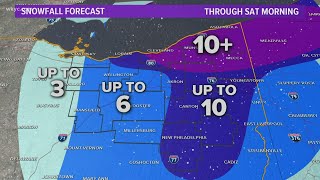 What's Next forecast: Snow continues overnight before transitioning to lake effect snow Christmas Da