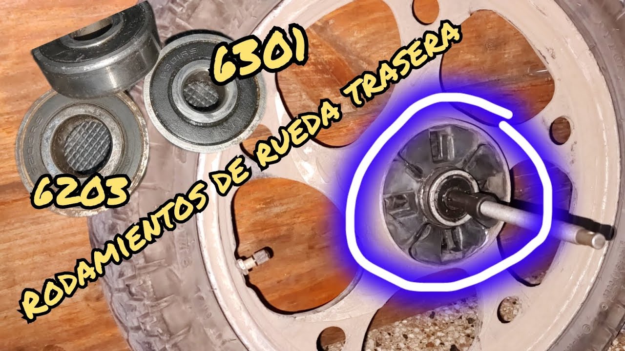 Retiro de rodamientos o balineras en rueda trasera de Gilera Smash 110