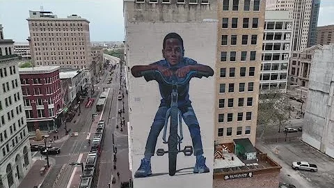 11-year-old subject of 10 stories tall mural is UH Basketball's biggest fan