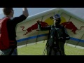Hang Glider Touches Down on Sail Plane