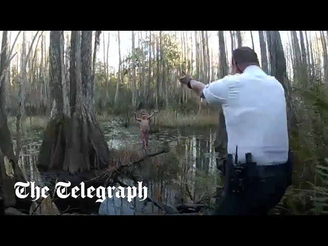 Moment missing 5-year old girl with autism is rescued from swamp class=