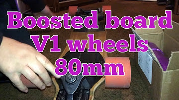 purple Kegels 80mm on V1 boosted board