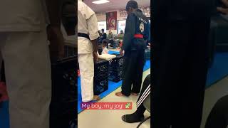 Board breaking in karate! #autism #asd #orangebelt #myson #blackboyjoy #karate #shorts
