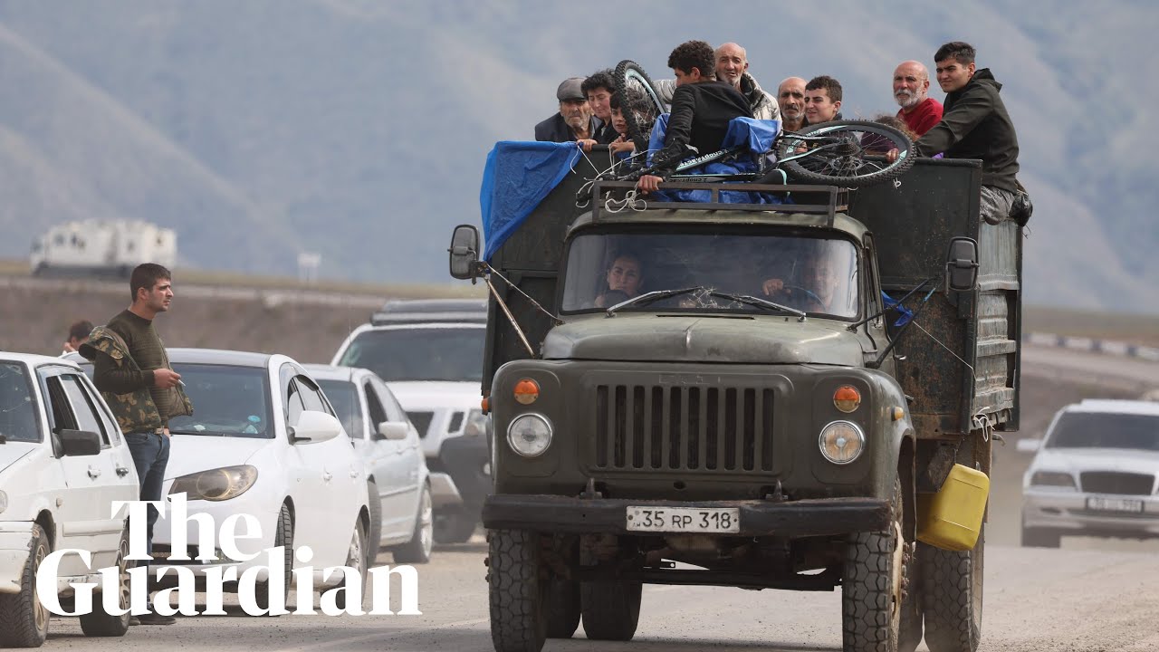 ⁣'I'll never return': thousands flee Nagorno-Karabakh after Azerbaijan gains control