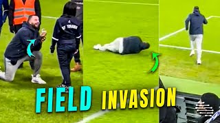 Guy Falls Trying to Invade a Football Field