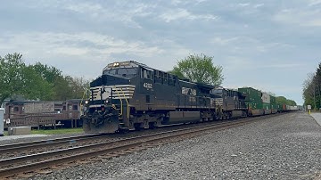 A NS intermodal with a dash 9 leading HAULS through Chesterton!
