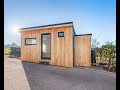 4 m x 3 m recreational space garden studio with kitchenette and toilet clad in siberian larch