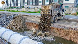 Amazing Drain Construction Komatsu D31P Dozer and 5 Ton Dump Truck Working Together.