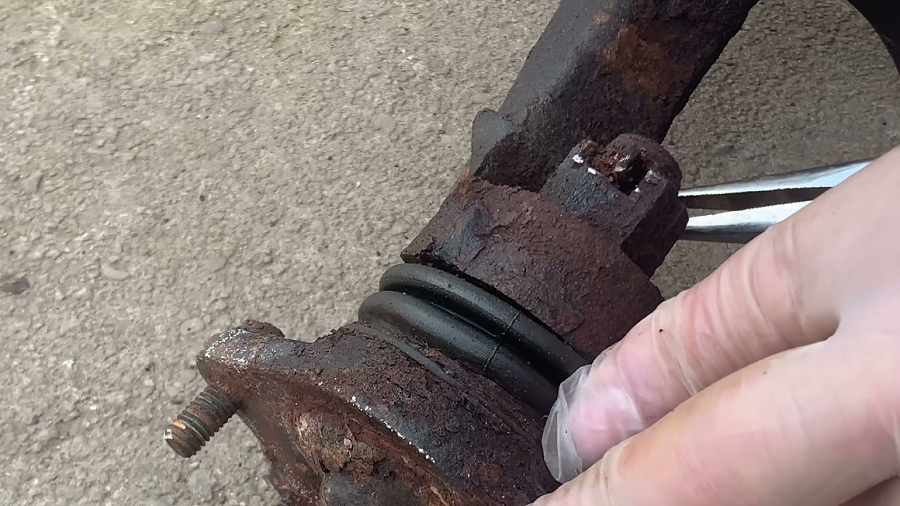 How to remove a stuck cotter pin from a ball joint castle nut YouTube