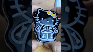 Skeleton Hello Kitty Pour Jelly Belly Into Turtle Dish Joy 