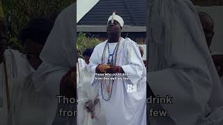 Ooni of Ife praying by the Well of Yeyemoolu inside the place