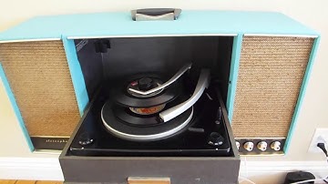 Phonola STEREO automatic record player playing a stack of 45