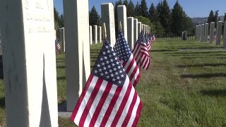 Volunteers plant 5,000 flags at veteran graves at Butte cemeteries