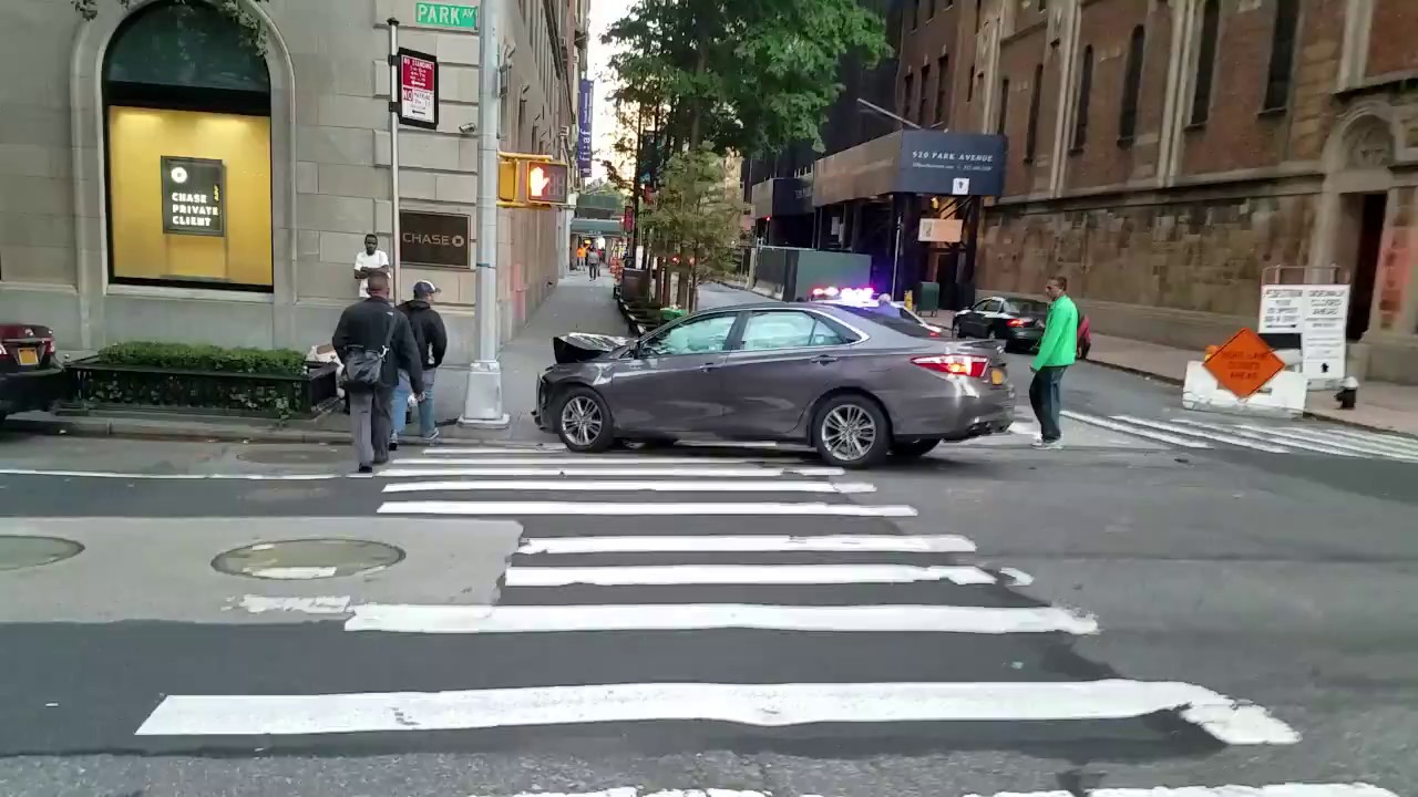 NYPD On Scene Of The Aftermath Of A NYC TLC Car Which Had Been In An