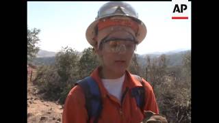 Among the hundreds of hand crews clearing brush and preventing a wide spread wildfire from expanding