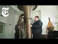 Playing a titanic tuba  the new york times