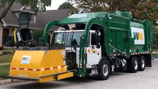 Brand New Garbage Truck On A Yard Waste Route