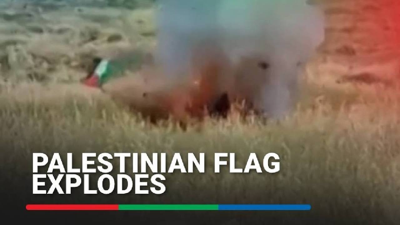 Palestinian flag explodes when Israeli man tries to remove it  ABS CBN News