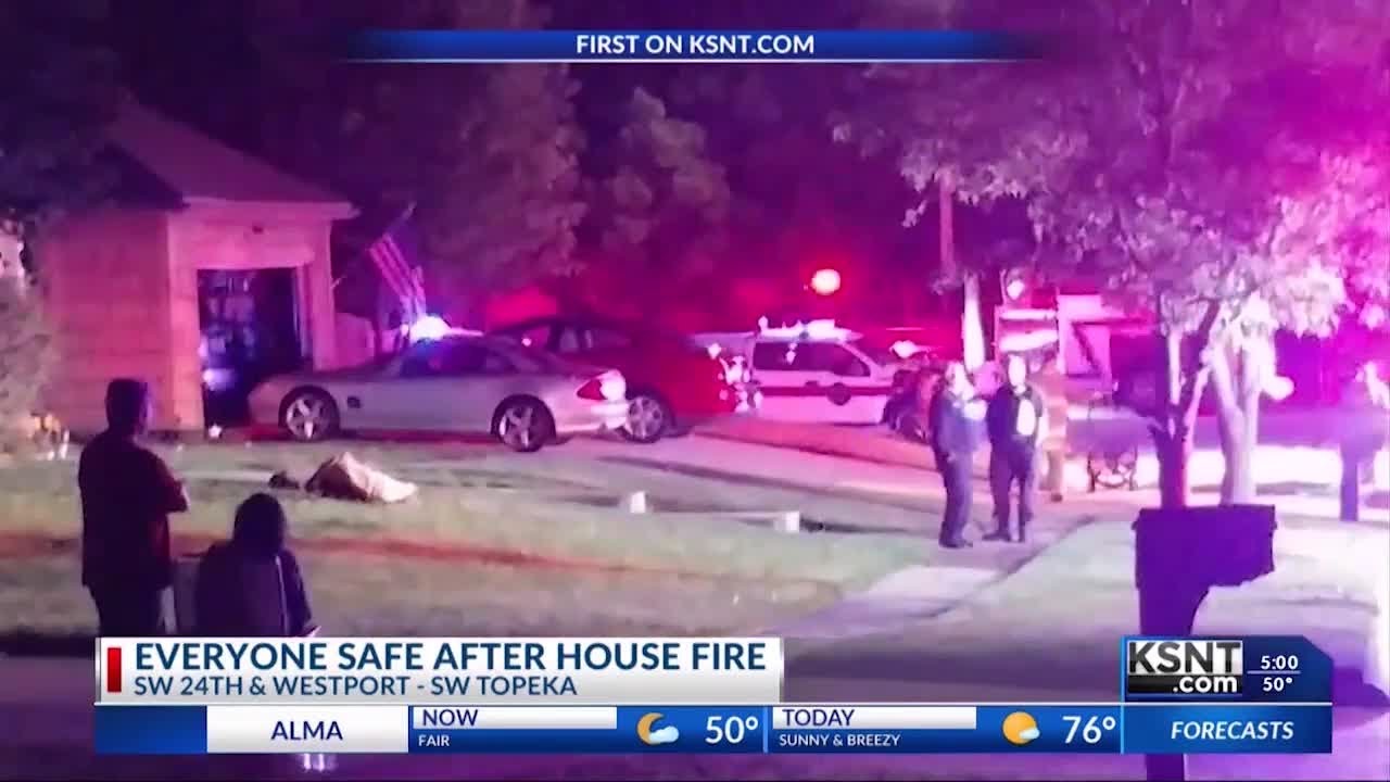 Firefighters work to put out early morning house fire - YouTube