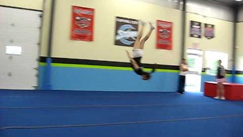 Round off back handspring back layout step out