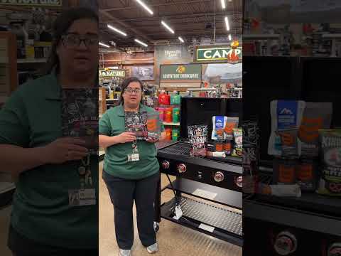 Indoors, Shop, Person. Text: CAMP