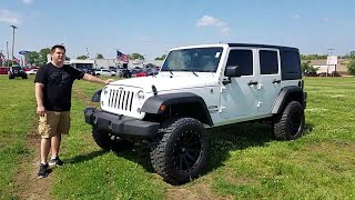 2016 Jeep Wrangler Unlimited 4 inch lift 35 inch tires - YouTube