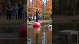 She balances on floating balls to cross a pond #viralvideo #ytshorts #viral #usa #pool