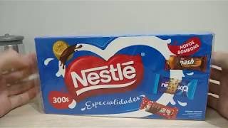 Abrindo caixa de bombons Nestlé Especialidades