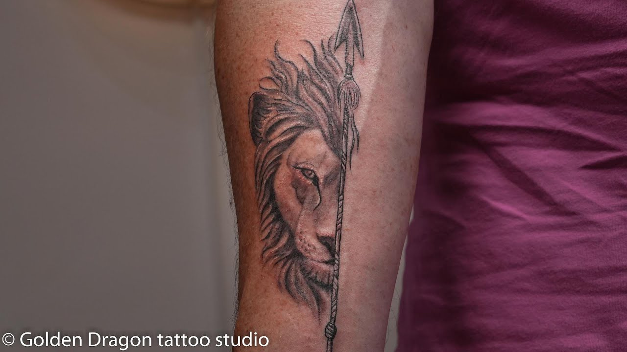 Lion and arrow tattoo designs